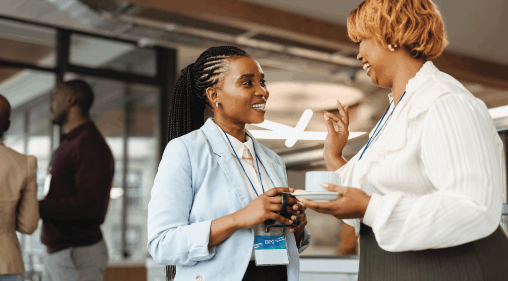 Two women networking at a networking event